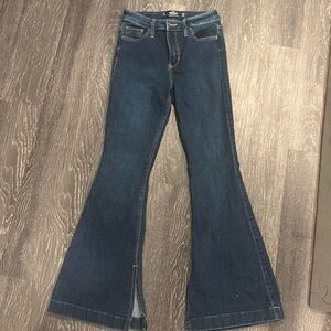Hollister flare jeans. Dark wash and tight on the thigh.